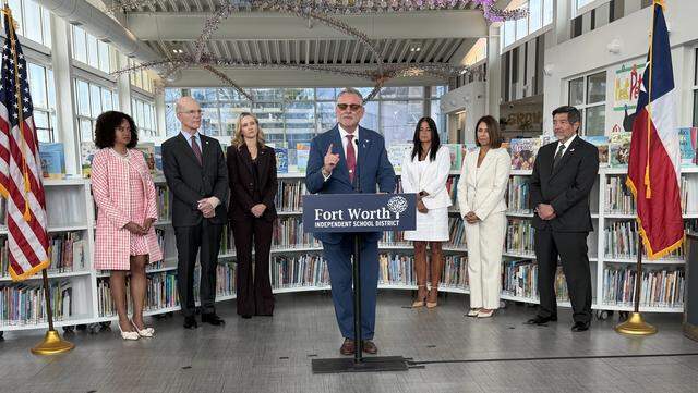 Peter Licata, the state-appointed superintendent of the Fort Worth school district, speaks during a news conference Tuesday, March 24, 2026, at the Reby Cary Youth Library. He was joined by board member Courtney Lewis, left; board chair Pete Geren; Fort Worth Mayor Mattie Parker; his wife Maria Licata; and board members Rosa Maria Berdeja and Luis Galinda.